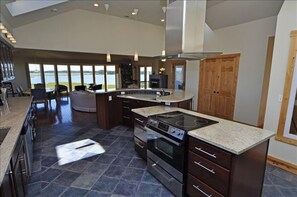 Too Many Cooks?  They will love this!  Two sinks, a horseshoe bar, granite!!