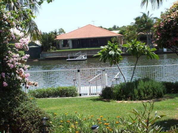 view from rear yard overlooking canal