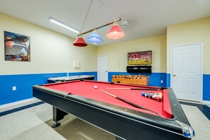 Fully air-conditioned game room with air-hockey, foos ball table and pool table