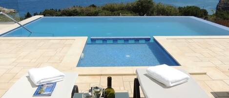 Zeus Bay Villa infinity pool with separate children's area.