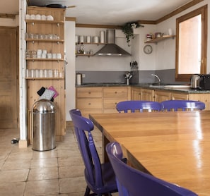 Dining table and the open kitchen