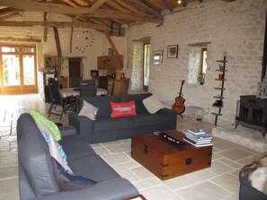 Relax in the 200 year old lounge. Stone and wooden beams create a natural bliss.