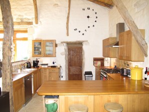 Our open plan kitchen is a very social place to be!