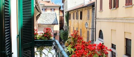 The view from the balcony: authentic buildings and wrought iron