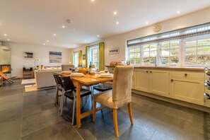 No. 2 The Fish Cellars, Port Isaac. Lower ground floor:  Dining kitchen through to sitting room