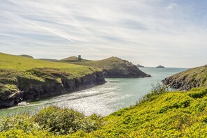 No. 2 The Fish Cellars, Port Isaac. Situated just across the road (literally footsteps from the water) from the picturesque cove at Port Quin