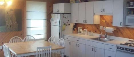 Southwest corner Great Room showing Kitchen