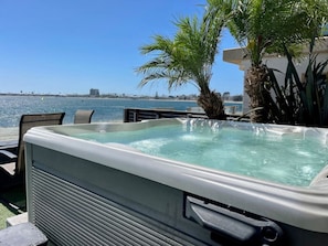Take in the views of the bay, watch sail races, and catch the sunset all from your private spa!