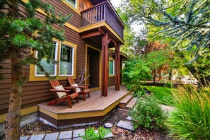 Front porch and beautiful front landscaping