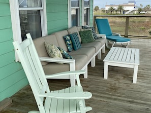 Comfortable furnishings complete this wonderful, large deck.