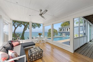 Screened porch is the perfect spot to enjoy the sunset