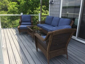 New deck furniture overlooking lake.