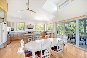 Kitchen and dining  with water views 