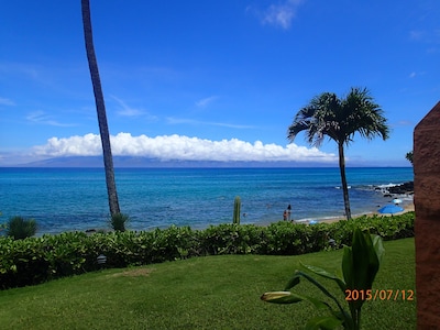 Only steps from the water edge from the lanai to enjoy the beach and sunsets