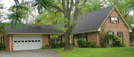 Front of the House. Parking for 4 cars to the left of the garage.
