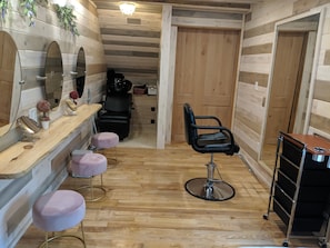 Bride's dressing area (makeup mirrors, stylist chair & hair wash station)