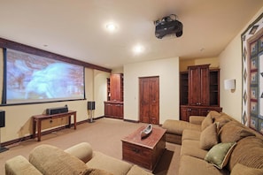 Media room with projection screen; DirecTV with 200+ channels / Roku