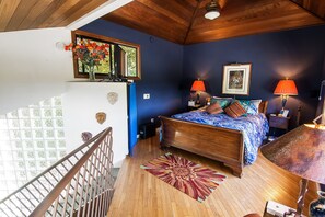 Loft bedroom with vaulted ceilings and sweeping ocean views. Conjoined bedrooms.