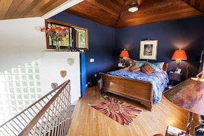 Loft bedroom with vaulted ceilings and sweeping ocean views. Conjoined bedrooms.