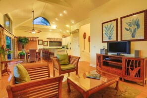The living and dining areas and kitchen are laid out great room-style.