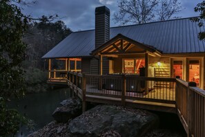 Private deck with 7 person hot tub. Excellent views of the river. 