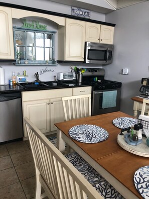 Seating for 5 at the kitchen table- 3 chairs and a bench 