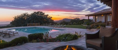 Enjoy a beautiful sunset by the firepit.