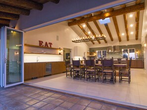 Dining room has wet bar, wine fridge, and ice machine.