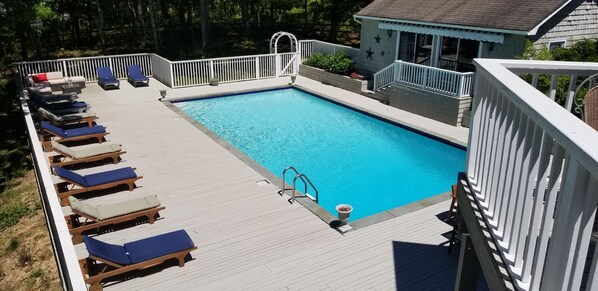 Pool deck and outside of pool house
