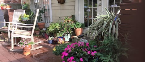 Backyard and deck accessible to guests