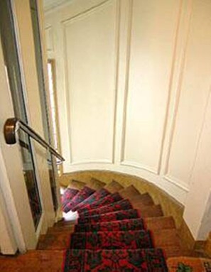 BUILDING ELEVATOR AND STAIRS