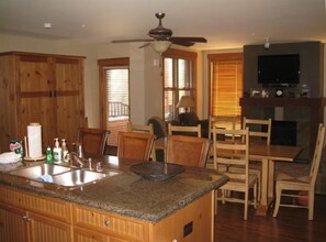 Dining/Living Room with Murphy Bed on Left total seating of 11