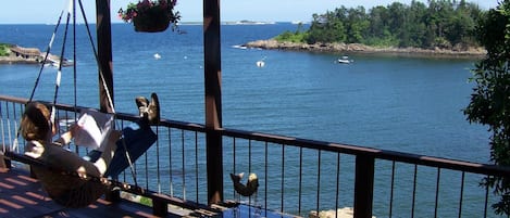 Deck overlooking Doliber's Cove and the North Atlantic. Beach is below to right.