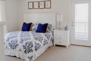 Primary bedroom, king bed, smart TV.