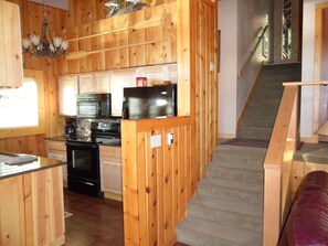 kitchen and stairs from entry 