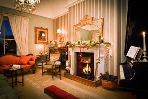 Christmas time in atmospheric elegant surroundings around the open fire