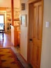 Solid wood doors, slate/hardwood floors, handmade rugs & stacked stone fireplace