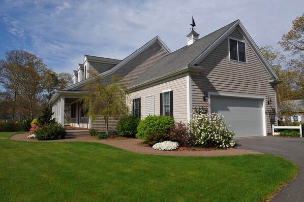 Side view of the house & two car garage