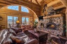 Upper Living Room with wood-burning fireplace, HDTV & DVD