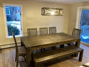 Dining Room table - seating for 8.  Additional 4 seats at island bar behind