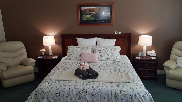 Enjoy comfort in a luxurious king size bed with private ensuite and kitchenette.