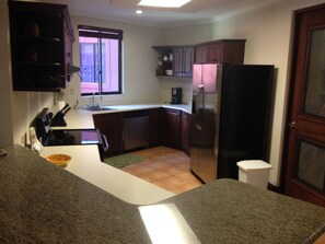 Full kitchen with dishwasher and all the essentials for cooking at home