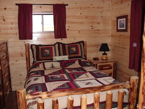 Comfortable queen size log bedroom suite