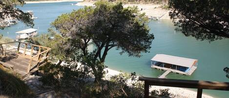 View of dock and cove from stairs