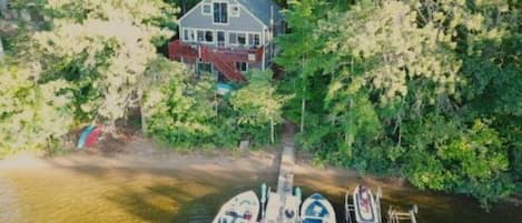 Aerial view.  Note: The boat slip to the left will be open for your use.