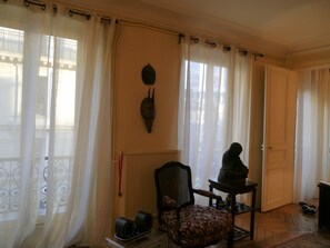 3 French windows in living room