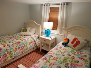 twin beds in second bedroom
