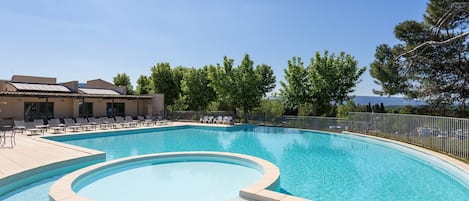 Dive into the lovely seasonal outdoor pool during the summer.