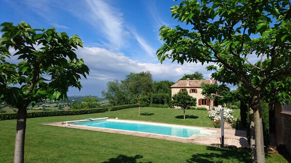 View over pool, garden and surrounding countryside