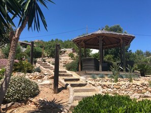 The balinese pergola is a fabulous place to enjoy the garden and the view